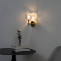 Gold wall light, clear glass