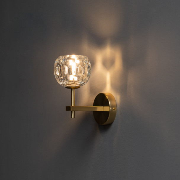 Glass wall light with relief