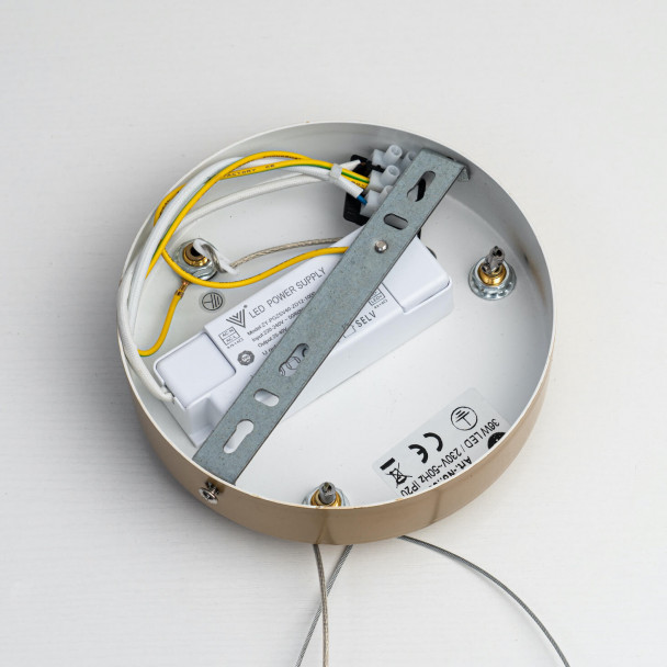 Pendant light with a round golden base