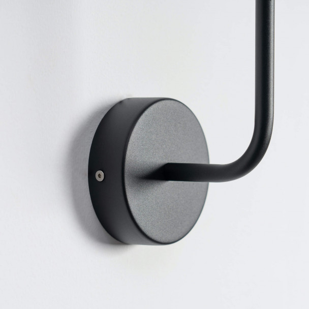 Wall light with small round base