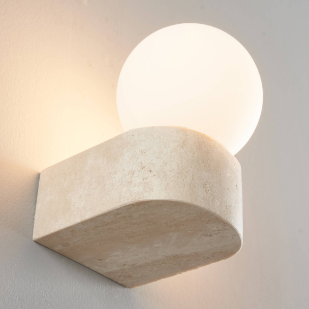 Modern round travertine wall light - Oriane