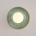 Seafoam green glazed ceramic wall light with white globe - Evyra