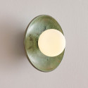 Seafoam green glazed ceramic wall light with white globe - Evyra