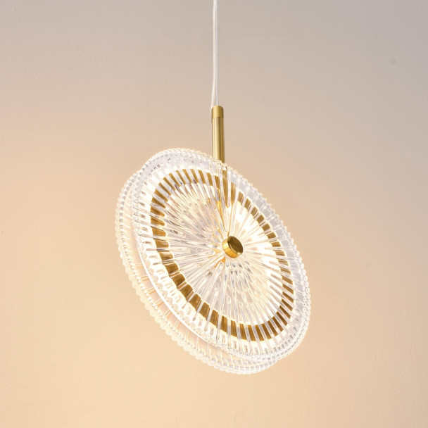 Gold LED pendant with textured clear glass disc...
