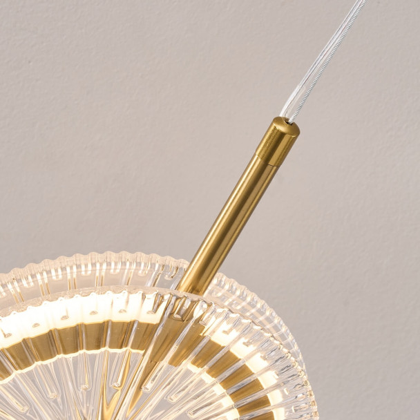 Gold LED pendant with textured clear glass disc...