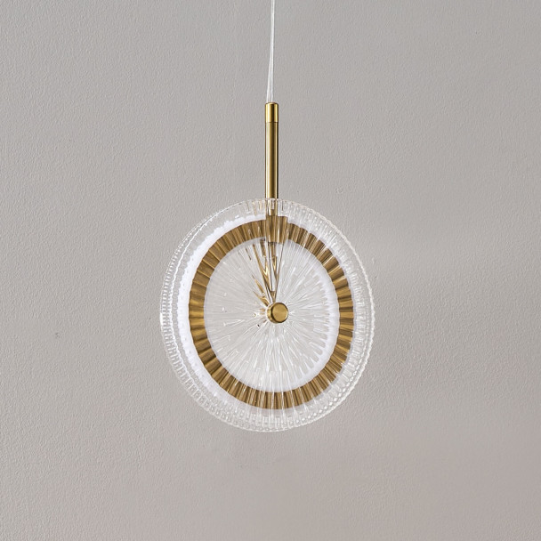 Gold LED pendant with textured clear glass disc...
