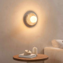 Round travertine wall light with white glass - Milenka
