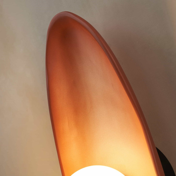 Brown pebble ceramic wall light with white...